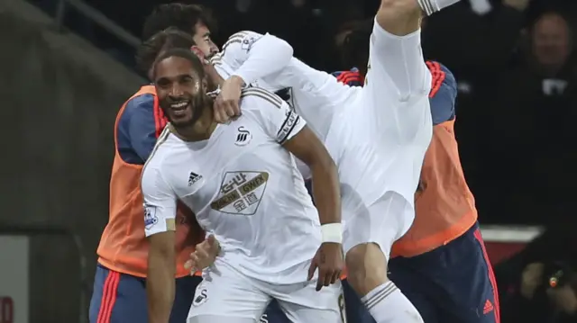 Ashley Williams celebrates