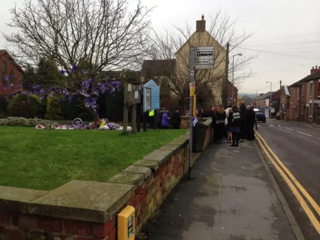 Mourners outside church