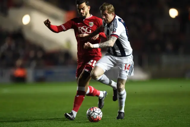 James McClean battles for the ball