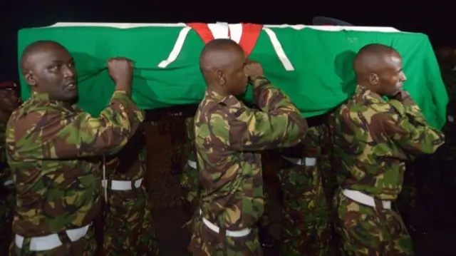 The body of a Kenyan soldier arriving back in Kenya
