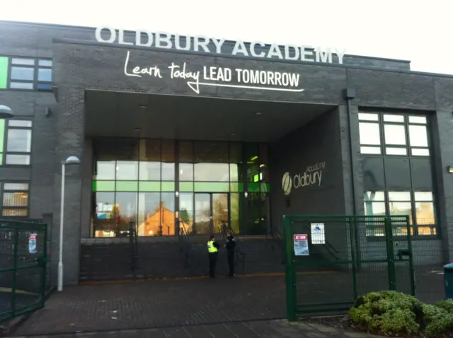 Police officers outside Oldbury Academy