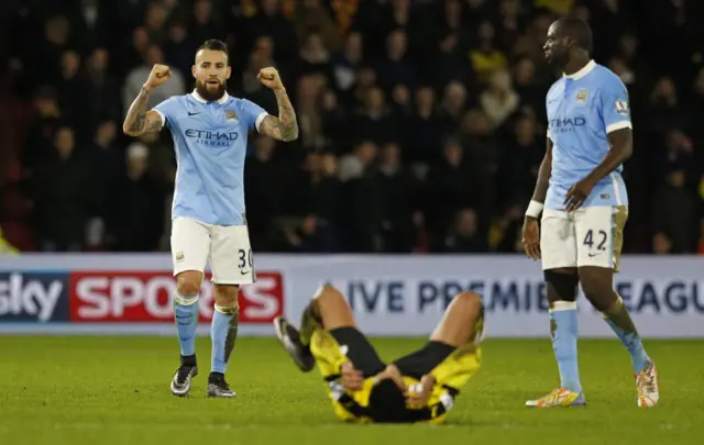 Yaya Toure and Nicolas Otamendi celebrate