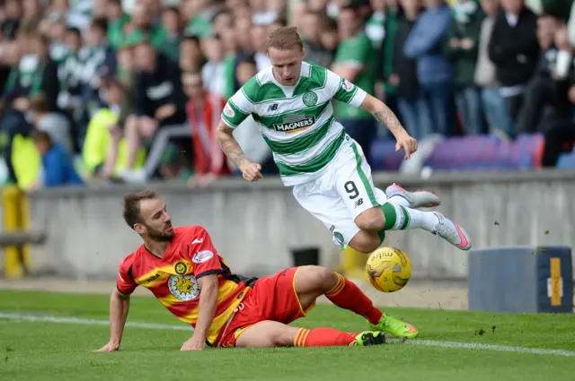 Celtic's Leigh Griffiths (right) is challenged by Sean Welsh