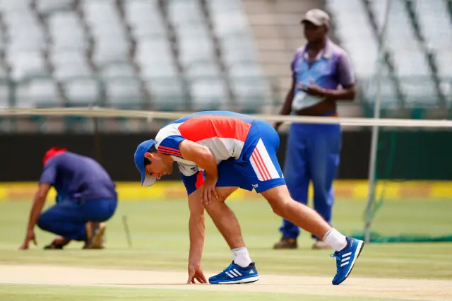 Alastair Cook looks at the wicket