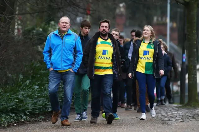 Norwich City fans make their way to Carrow Road