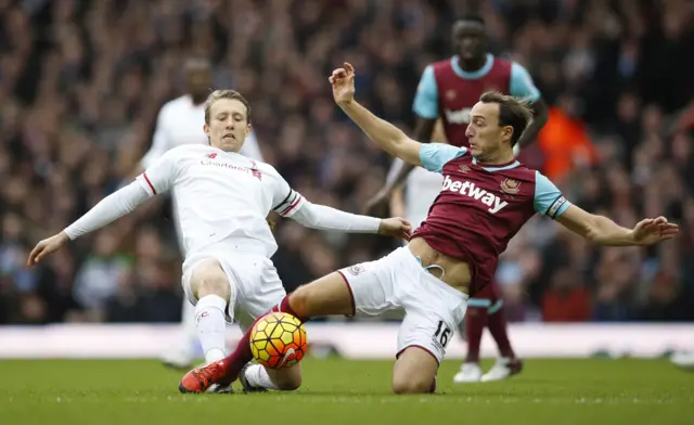 Liverpool's Lucas Leiva and West Ham's Mark Noble