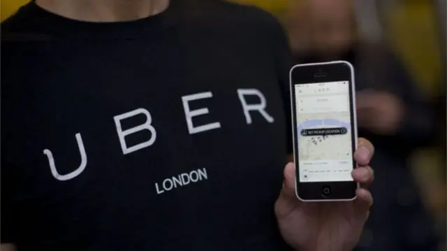 Man wearing an Uber T shirt