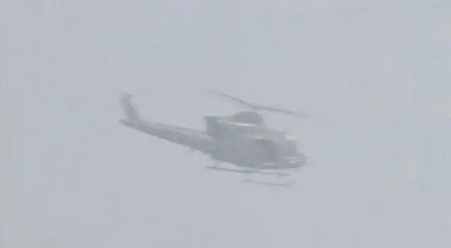 Helicopter is seen at Bacha Khan University where an attack by militants took place, in Charsadda