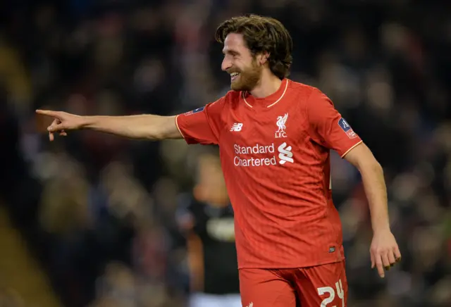 Joe Allen celebrates