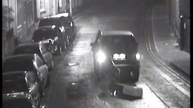 CCTV image of car dragging ticket machine
