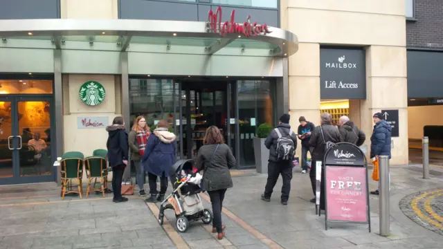 A small crowd gathers to see Strictly stars leave the hotel