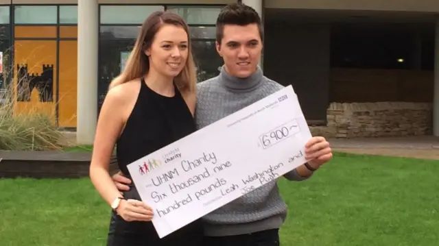 Leah Washington and Joe Pugh with cheque