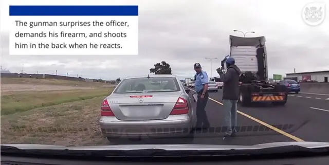 South African police officer approached by gunman