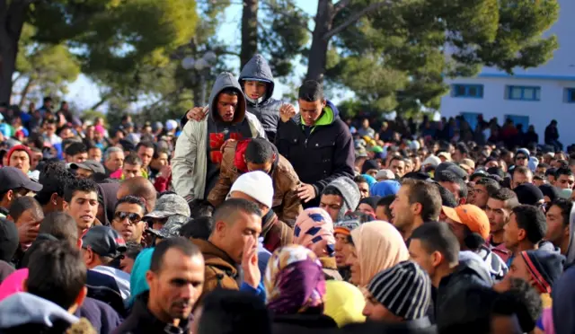 Protesters gather outside the local government office during a protest in Kasserine, Tunisia