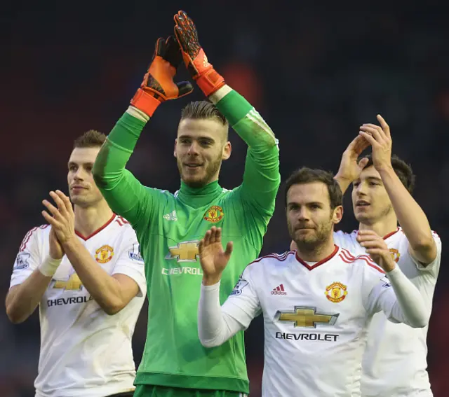 Manchester United celebrate victory over Liverpool