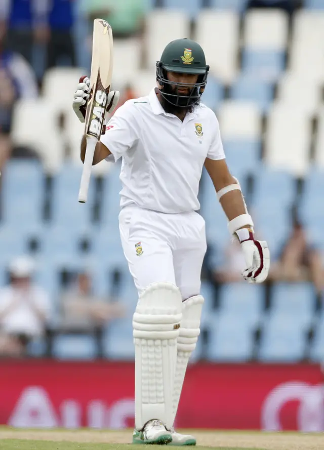 Hashim Amla raises his bat