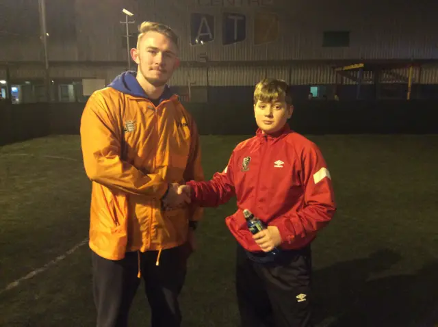 Man of the under-14s tournament Sam with the referee