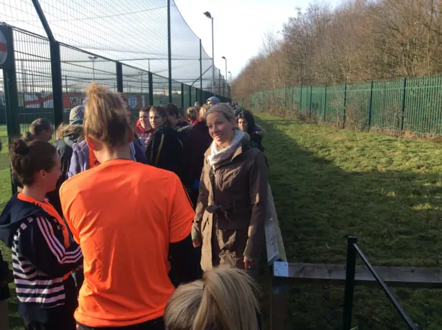 Rachel meeting her team.