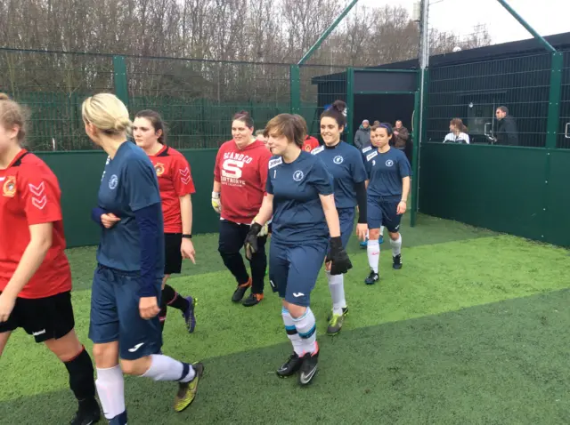 Walking onto the pitch