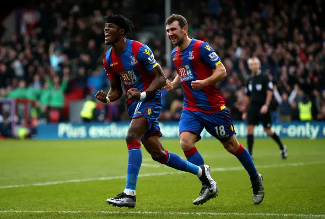 Wilfried Zaha and James McArthur of Crystal Palace celebrate