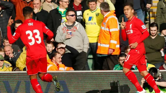 Roberto Firmino celebrates