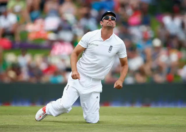 Alastair Cook reacts after a missed catch