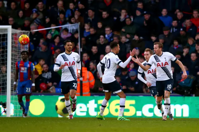 Harry Kane celebrates after scoring Tottenham's equaliser