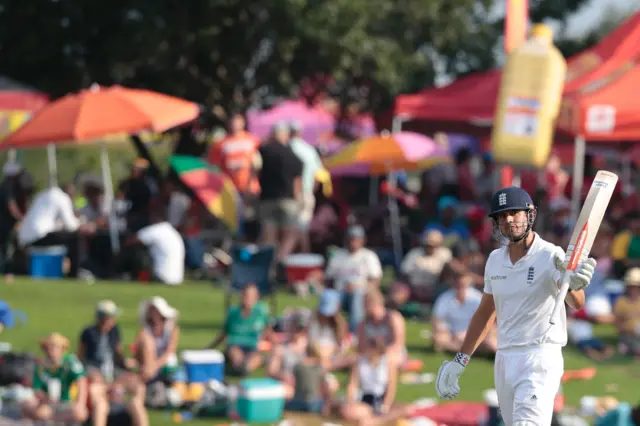 Alastair Cook celebrates his 50