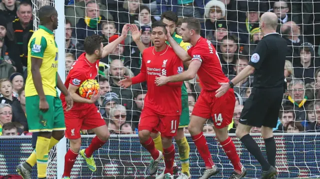 Roberto Firmino celebrates