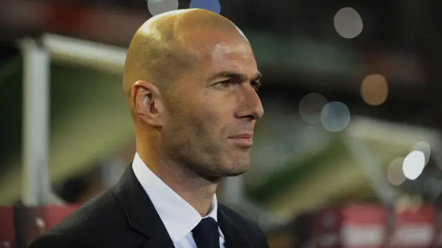 Zinedine Zidane looks on