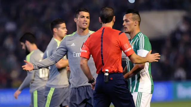 Cristinao Ronaldo speaks to the referee