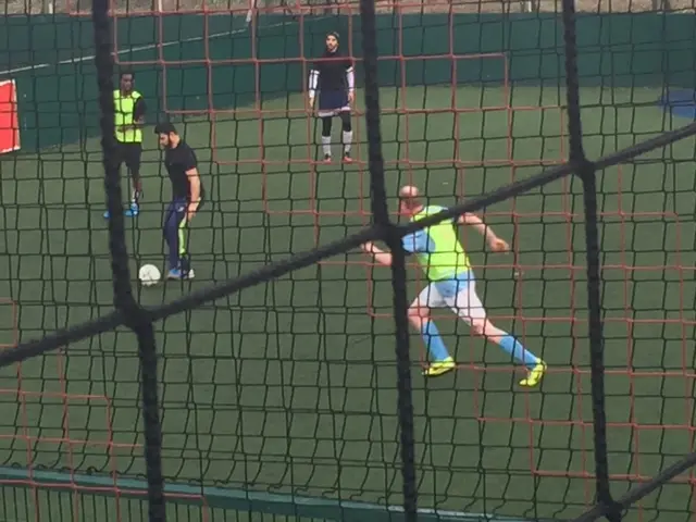 Action shot of Paul Baker playing in 5-a-side match