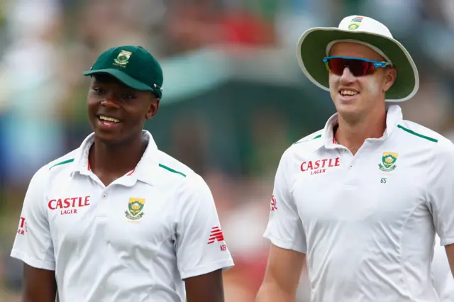 Kagiso Rabada and Morne Morkel walk off the field for lunch