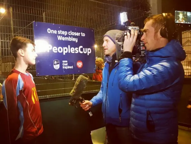 BBC crew interviewing young male player