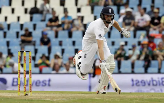 Chris Woakes runs between the wicket