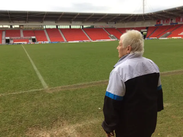 Jan Milner looking out over a football pitch