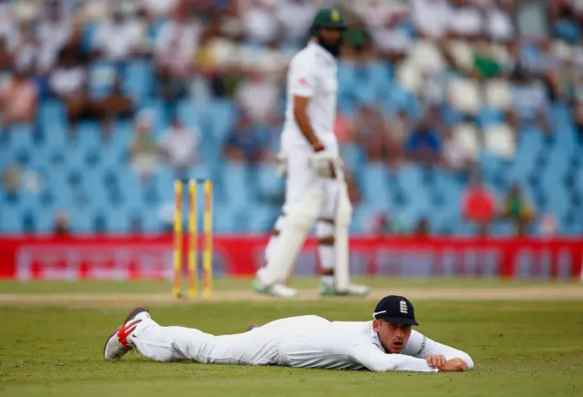 Alex Hales watches as the ball reaches the boundary