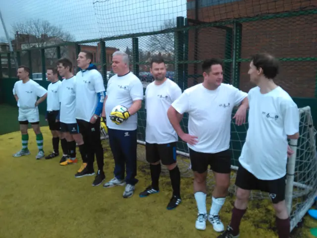 Chris Hawkins with this team on the pitch