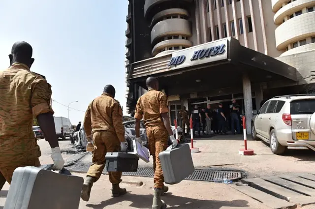 Investigators arrives at the Splendid hotel, on January 17, 2016 in Ouagadougou