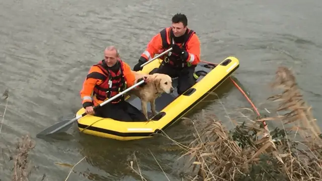 Karl Hain and Kevin Peat with Dave on their raft