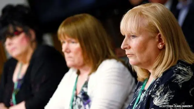 Olive McIlroy, centre, and Elaine Holmes, who have both received surgical mesh implants, giving their 'heartbreaking' evidence to the the Scottish Parliament