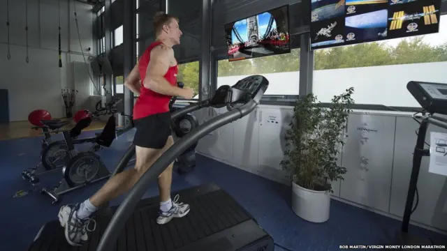 Tim Peake training on a treadmill.