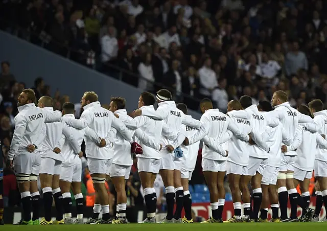 England players line up for the national anthems