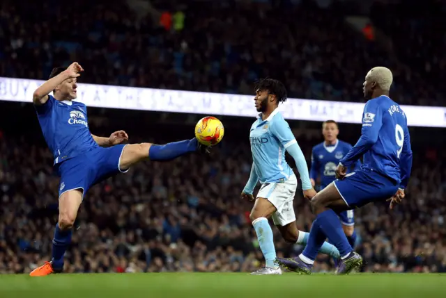 Gareth Barry and Arouna Kone challenge Raheem Sterling