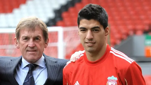 Luis Suarez is unveiled as a signing by Kenny Dalglish