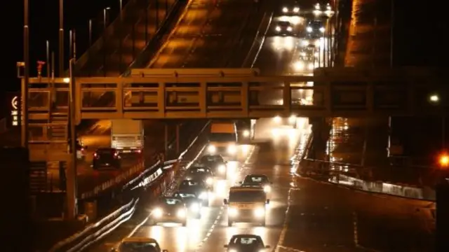 Cars crossing Forth Road Bridge at night