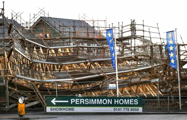 Earlier, the scaffolding from a house building site at Lenzie is pictured after it fell down overnight.