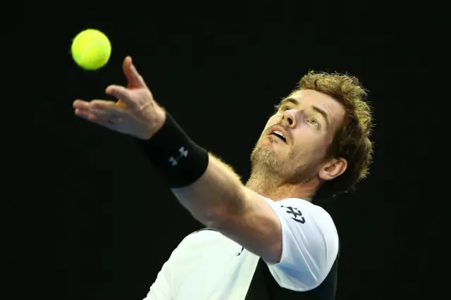 Andy Murray serves