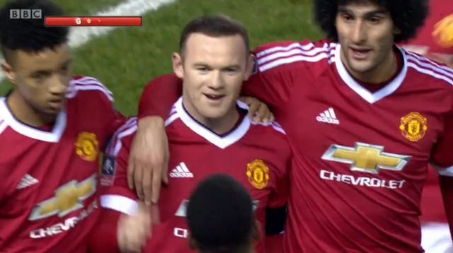 Wayne Rooney scores