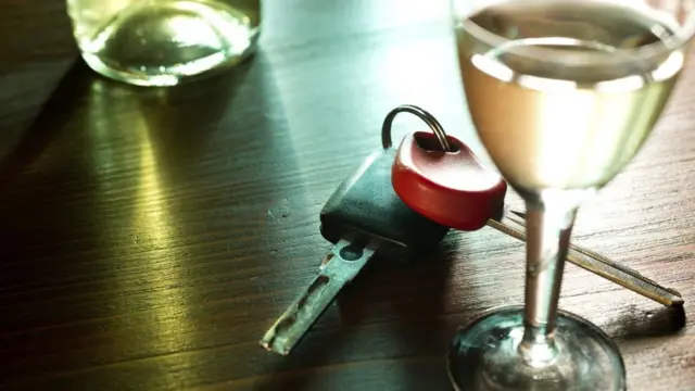 Wine glass and car keys